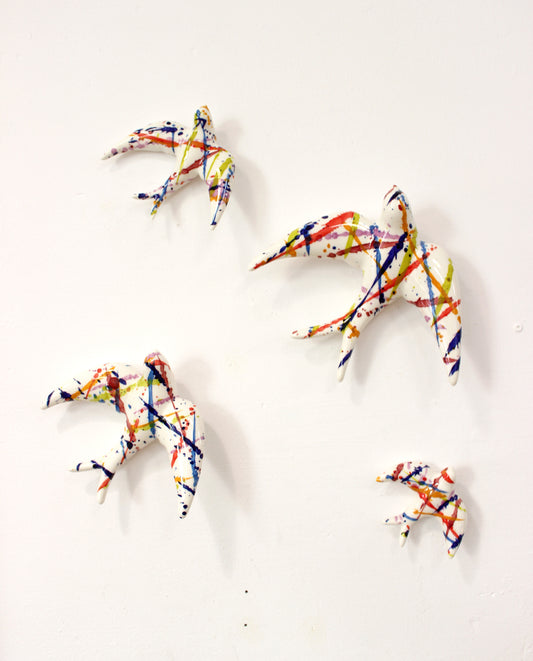 FAMILIA DE GOLONDRINAS MULTICOLOR